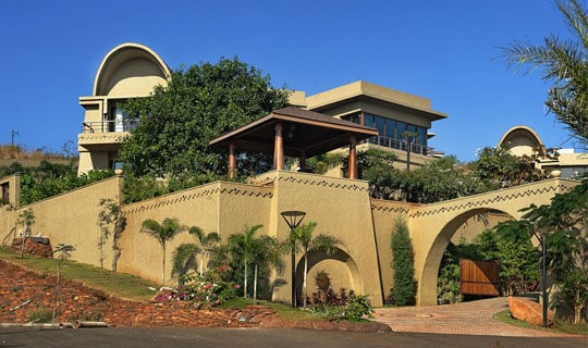 Approach road adorned with welcoming arches