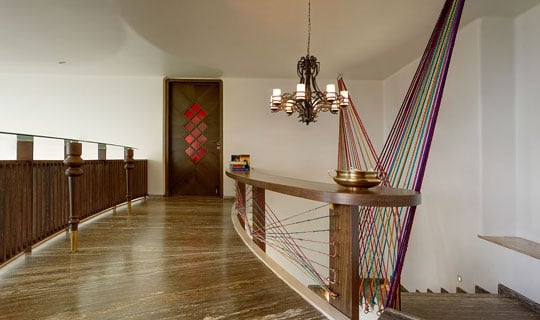 Stained glass embedded in doors allows a play of light and colour