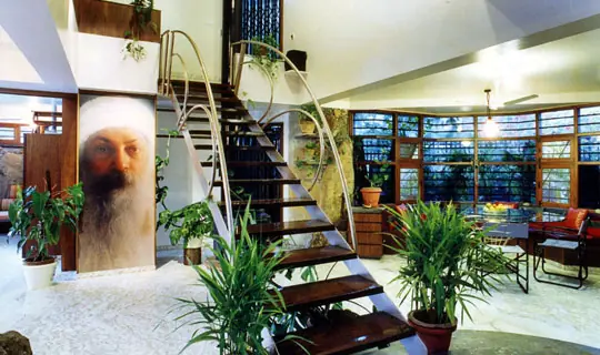 Living Lounge segregated by a lightweight floating staircase