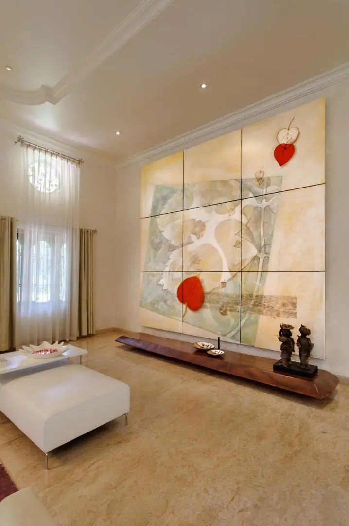 Full height paneled artwork adorning the formal area